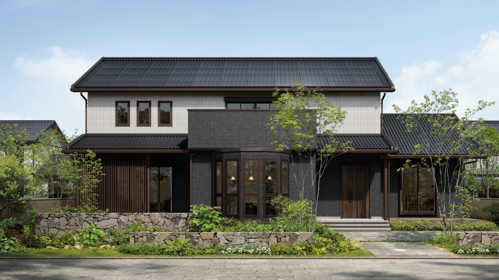 黒とグレーを基調とした住宅の外観写真